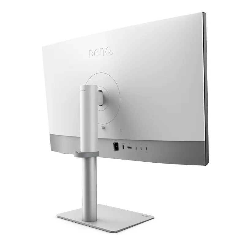 Close-up of the BenQ PD3226G Nano Matte screen surface diffusing ambient light reflections in a bright Kathmandu studio workspace.